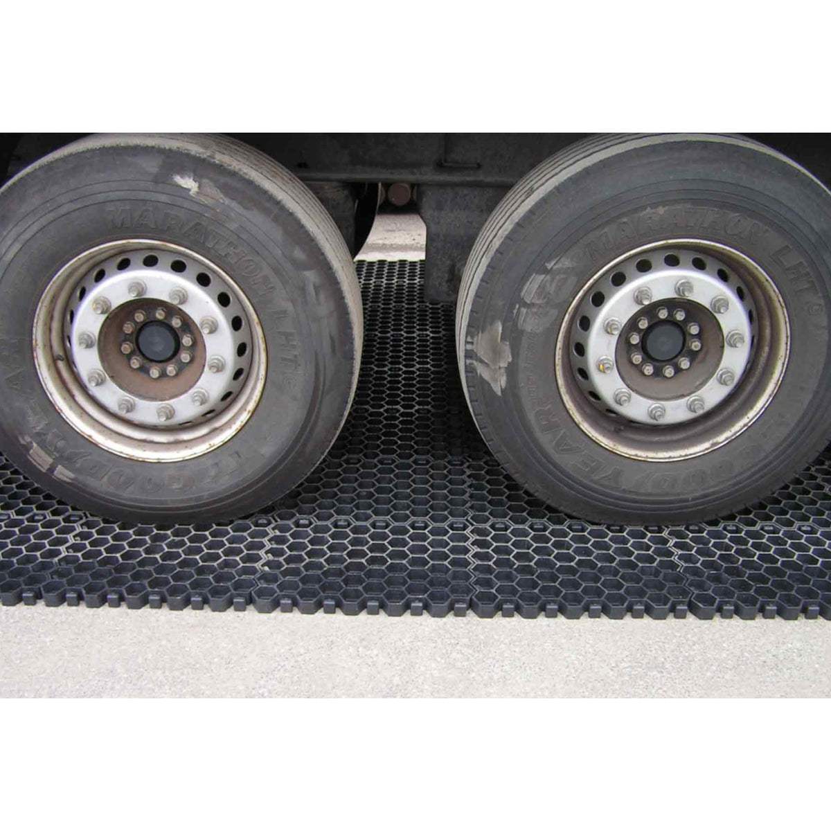 Loaded truck dual wheels parked on Hahn Paddock Slabs showing the load rating