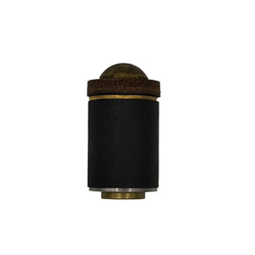Black cylindrical object with cork-like top on a white background
