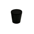 Black rubber stopper on a white background
