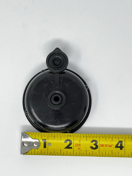 High Country Plastics black replacement cap ZC-100638 shown with a tape measure for sizing
