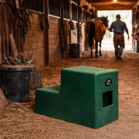 Green High Country Plastics MS-19 two step mounting block in a barn aisle