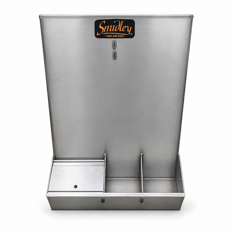 Smidley medication tank front view, upright stainless tank over a divided drinking trough