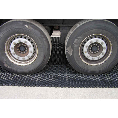 Loaded truck dual wheels parked on Hahn Paddock Slabs showing the load rating