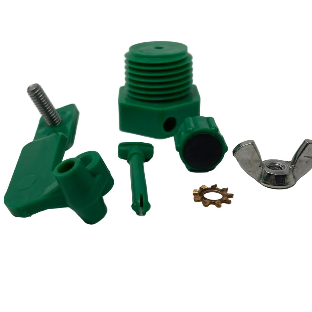 Green mechanical parts and a metal gear on a white background