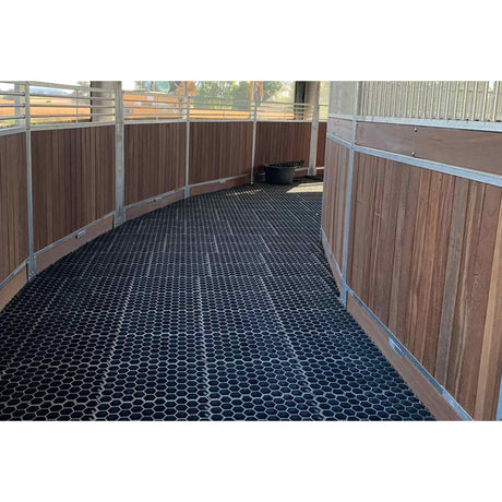 Hahn Paddock Slabs installed in a curved horse walker run
