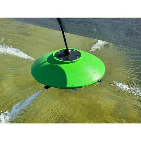 Water Rippler running in a stock tank, surface water moving across the tank